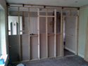 Old glass partition wall replaced with dry wall